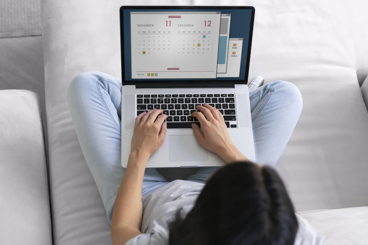 Woman checking her calendar to plan a salon appointment